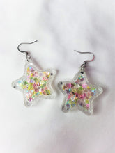 Load image into Gallery viewer, Shaker Star with Heart and Star Glitter UV Reactive Earrings-Black or Clear